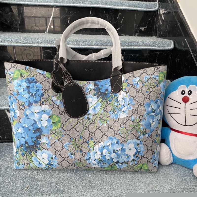 G*u*i shopping bags